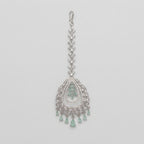 Zara Mint Tikka silver maang tikka with mint green center and teardrop dangles on gray background
