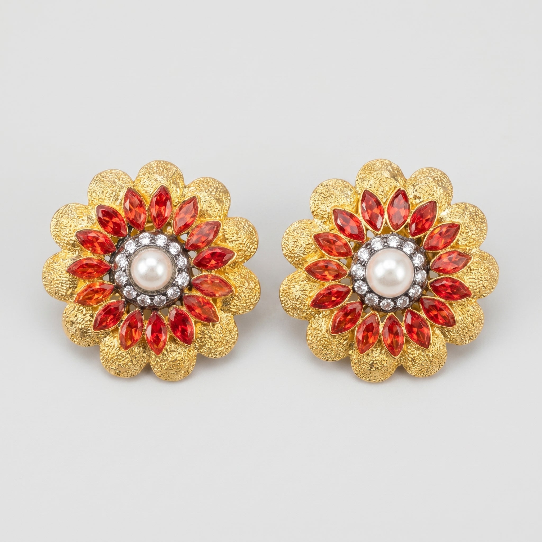 Manik Bloom Earrings gold-tone floral stud earrings with pearl center and red marquise petals