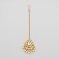Jadau Polki Tikka gold maang tikka with floral kundan centerpiece and seven teardrop dangles on gray background