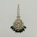 Priya Emerald Tikka gold fan maang tikka with green teardrop bead fringe on gray background