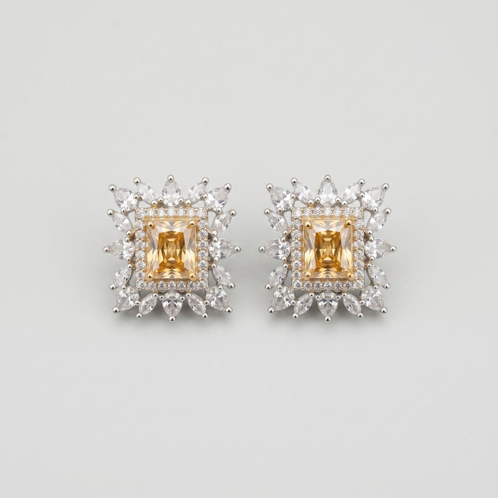 Citrine Square Earrings silver-tone square studs with golden citrine centers on gray background