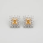 Citrine Square Earrings silver-tone square studs with golden citrine centers on gray background