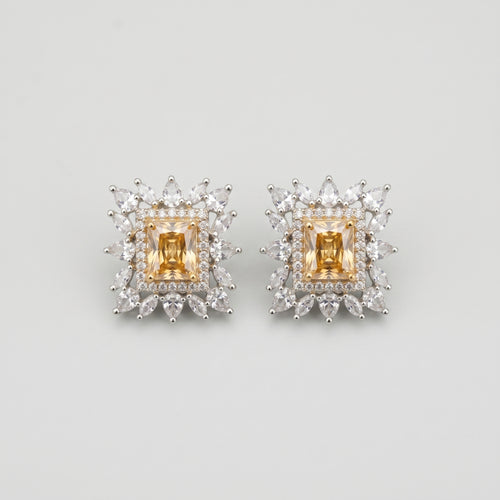 Citrine Square Earrings silver-tone square studs with golden citrine centers on gray background