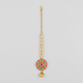Meenakari Tikka gold maang tikka with pink green target pendant and crystal chain on gray background