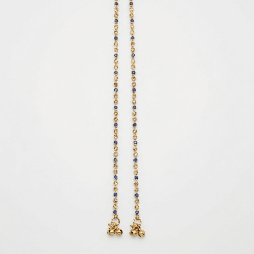 Midnight Glimmer Anklet detail of alternating navy and clear bezels