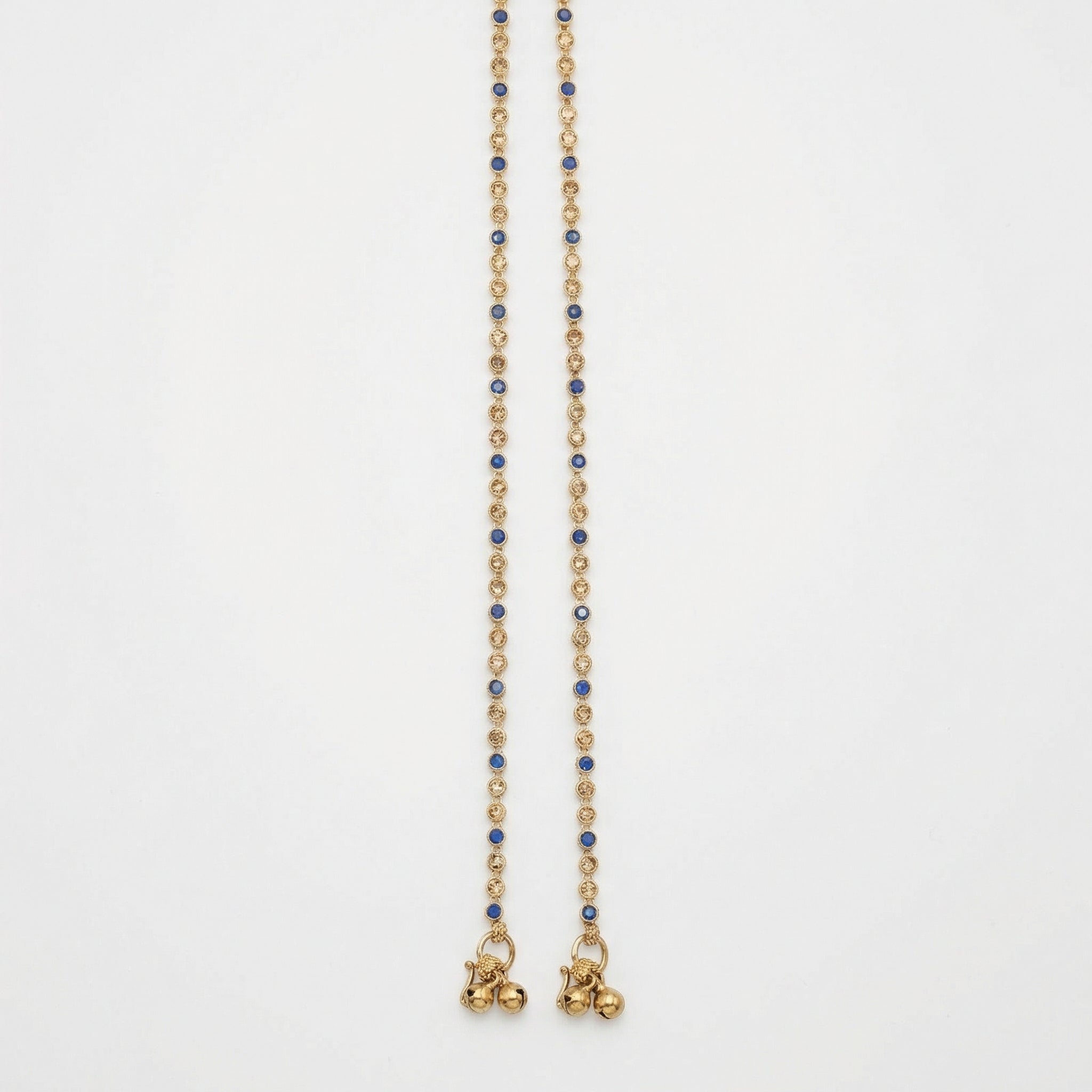 Midnight Glimmer Anklet detail of alternating navy and clear bezels