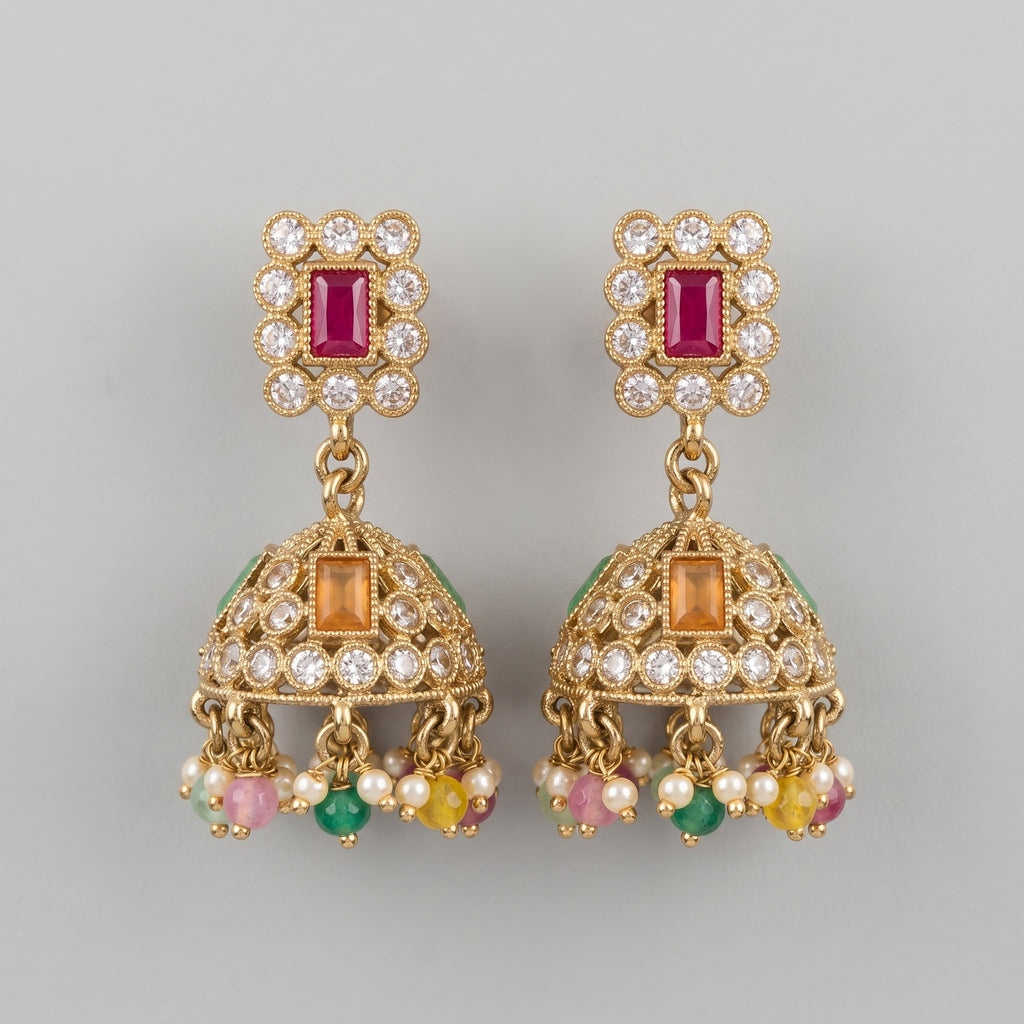 Kundan Earrings gold-tone multicolor kundan jhumka earrings with ruby stud on gray background