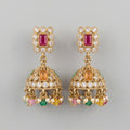 Kundan Earrings gold-tone multicolor kundan jhumka earrings with ruby stud on gray background