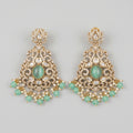 Zara Mint Earrings gold-tone chandelier earrings with mint green cabochon and pearl fringe on gray background