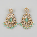 Zara Mint Earrings gold-tone chandelier earrings with mint green cabochon and pearl fringe on gray background