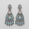 Aqua Leaf Earrings oxidized silver-tone chandelier drops with carved aqua leaf stones on gray background