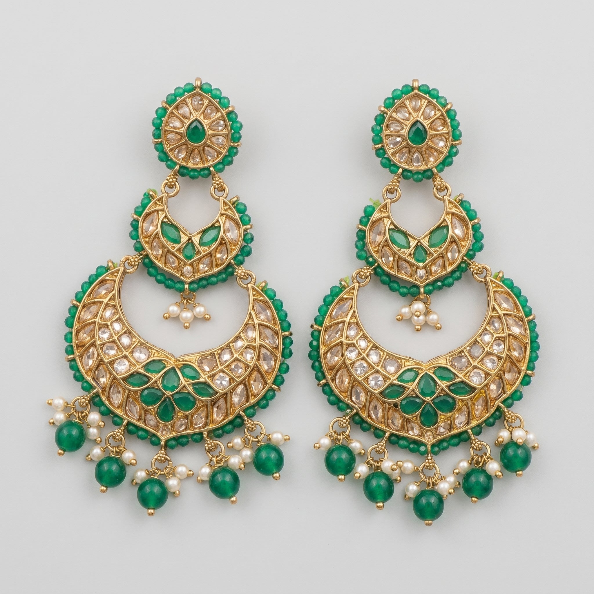 Jadau Panna Earrings gold-tone emerald chandbali drops with polki and pearl fringe on gray background