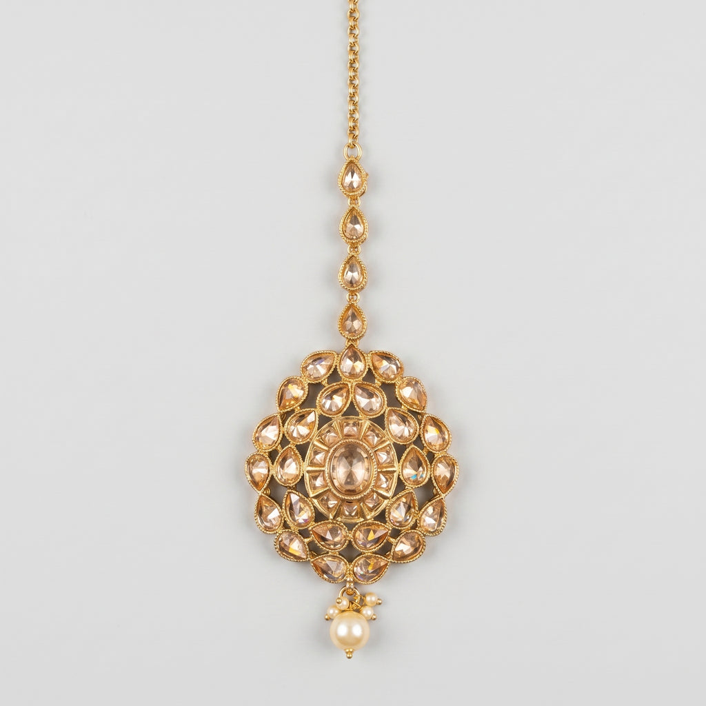 Polki Kundan Tikka gold-tone champagne stone maang tikka with pearl drop on gray background