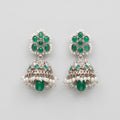 Rani Emerald Jhumka Earrings rhodium emerald jhumkas with pearl fringe on gray background
