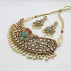South Asian woman wearing the silver-tone pearl choker with matching earrings — bridal look