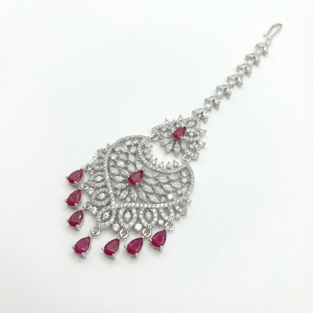 Moonfall Ruby Tikka detail of ruby-red center stones and seven bottom teardrop dangles