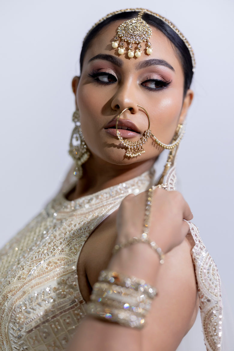 Model wearing Kiian jewelry