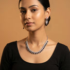 Rani Onyx Necklace Set detail of wave pavé links and black pear-cut stones