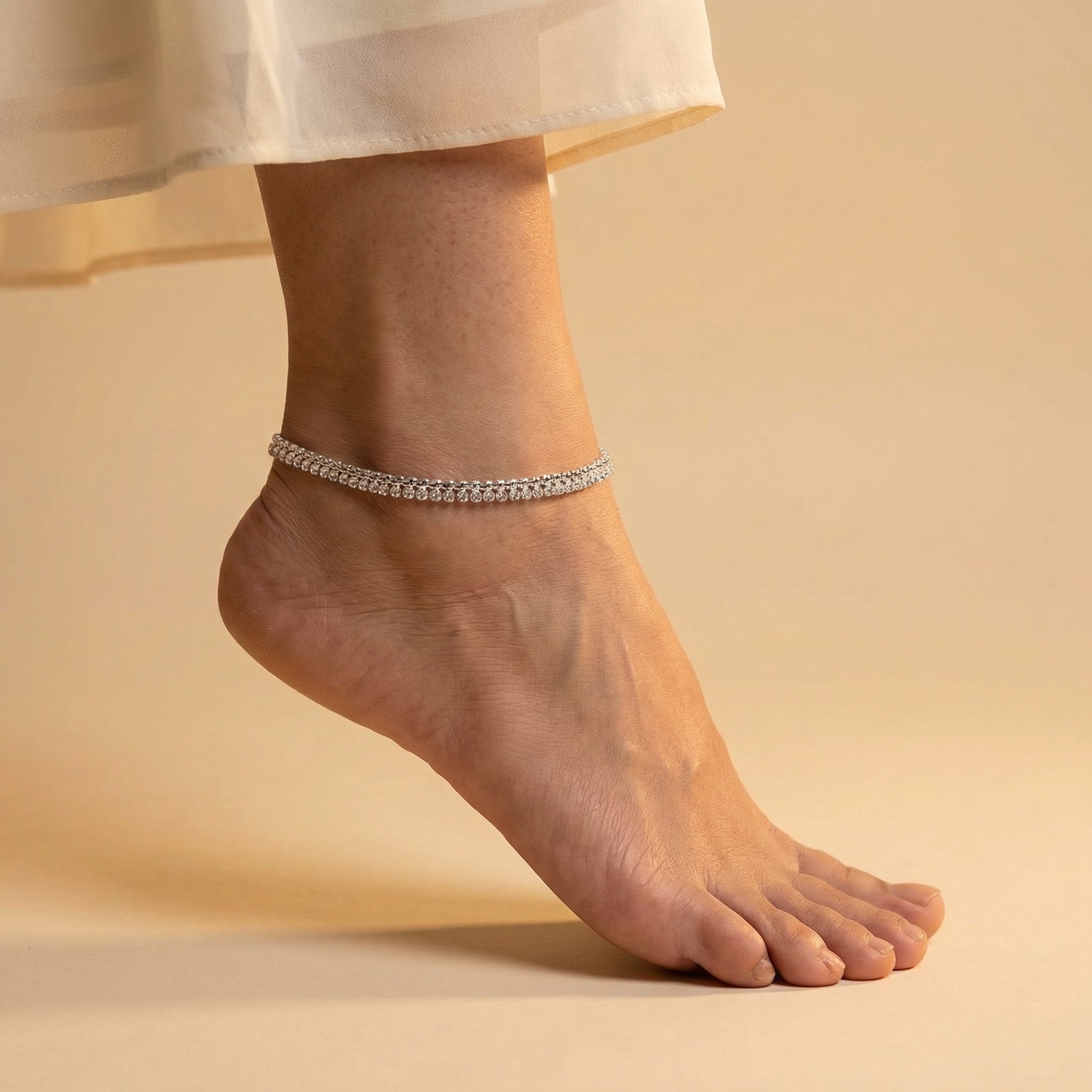 Starlight Anklet detail showing linked square stones and polished silver finish
