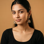 Moti Jhumka Earrings detail showing champagne floral top black stone bands and pearl fringe drop