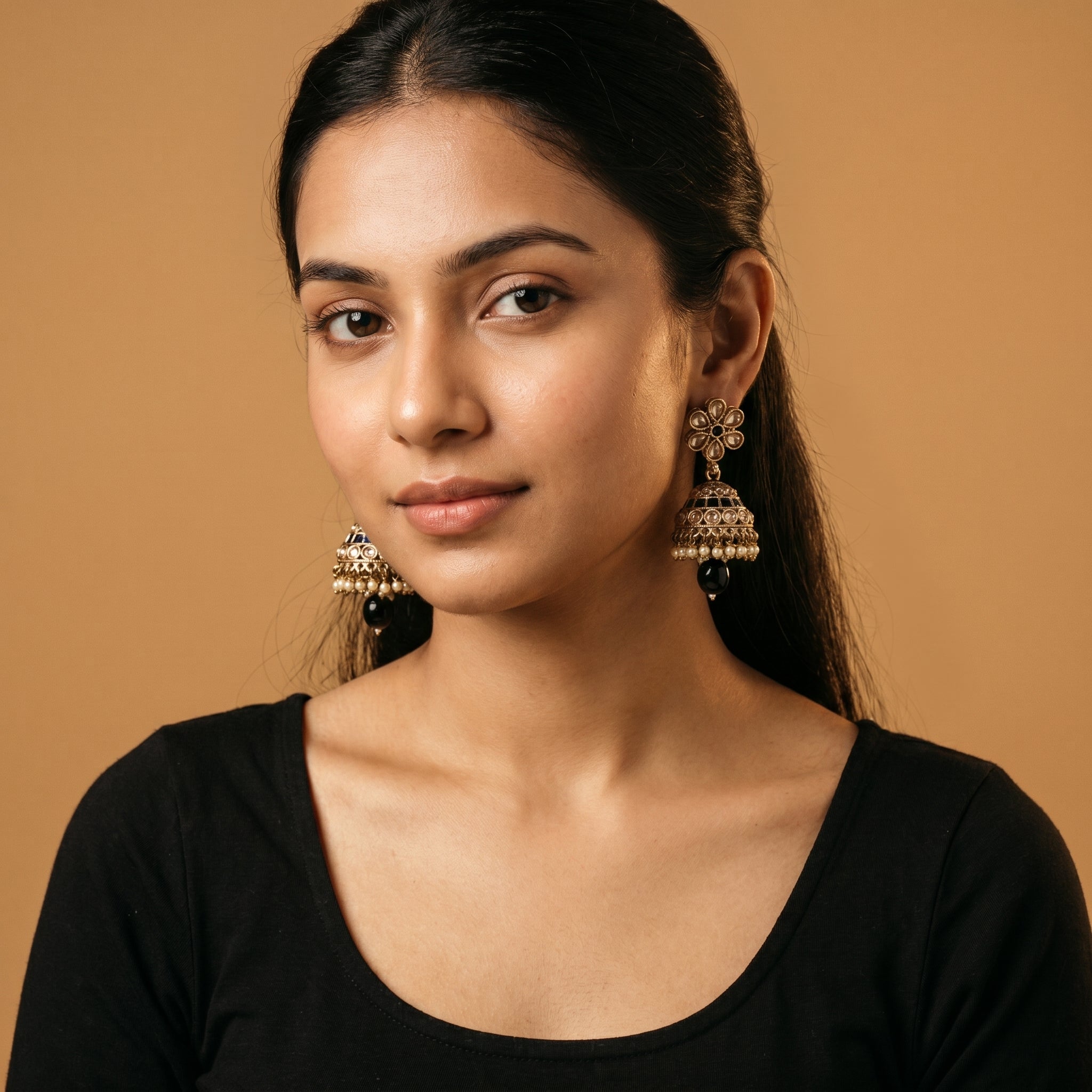 Moti Jhumka Earrings detail showing champagne floral top black stone bands and pearl fringe drop