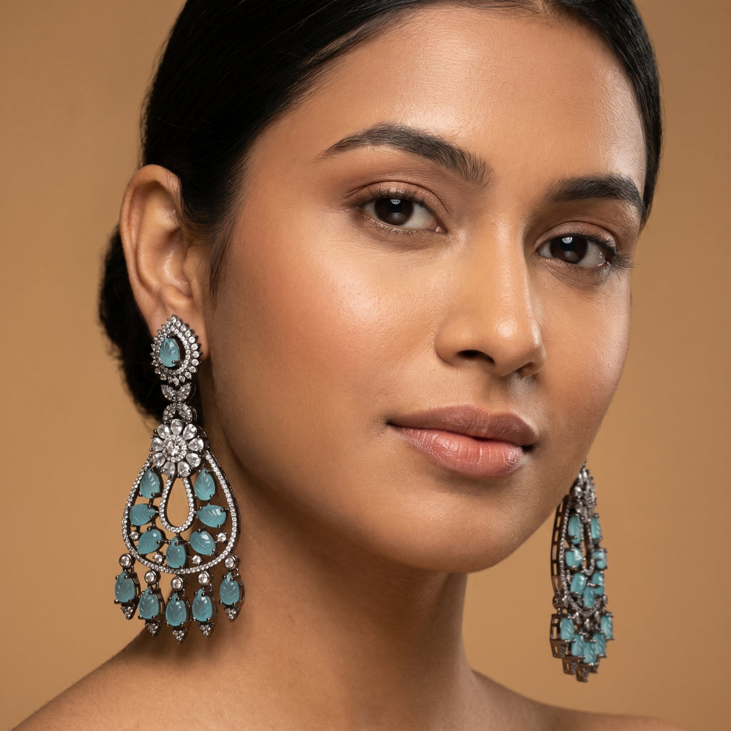 Aqua Leaf Earrings detail showing crystal floral connector teardrop leaf frame and fringe drops