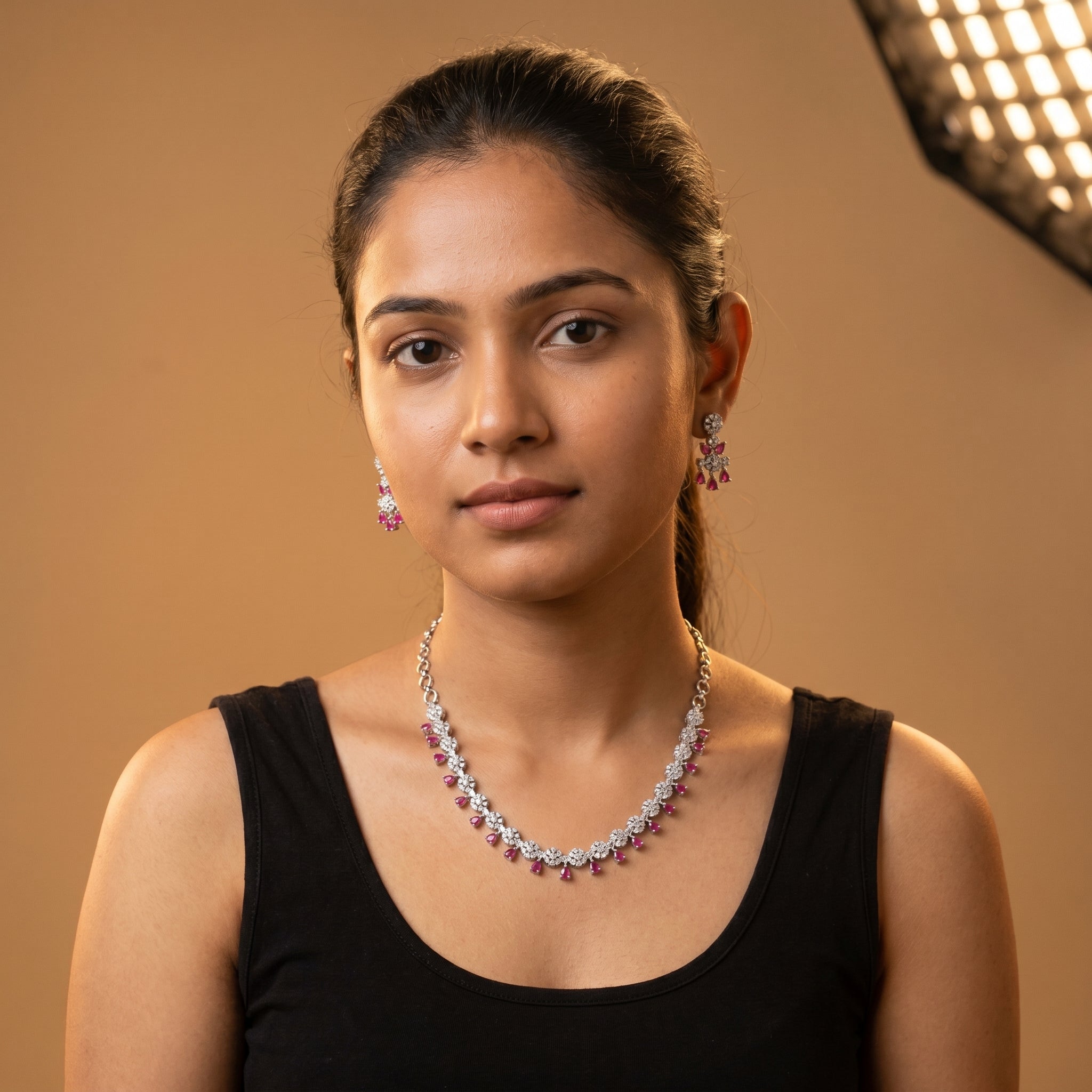 Gulab Droplet Necklace Set detail of pavé floral clusters and ruby-pink fringe drops