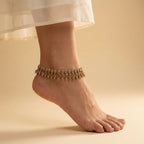 Paisley Drop Anklet detail showing diamond-link settings and antique metal finish