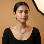 Aqua Rose Necklace Set detail of alternating pastel halo stones and pear aqua pendant