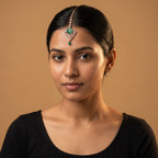 Pushpa Emerald Tikka detail showing teardrop chain emerald petals and pear drop