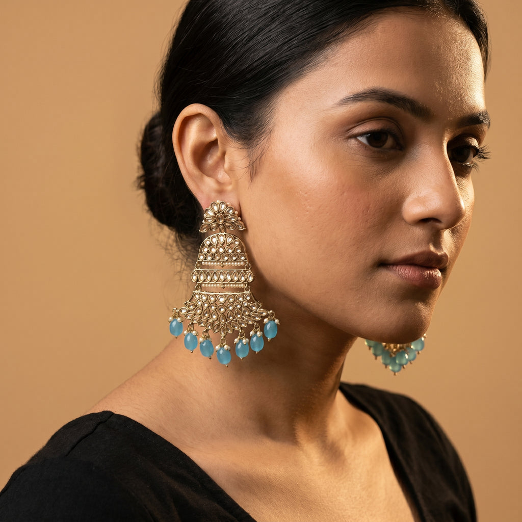 Pearl Aqua Earrings detail showing polki floral tiers, pearl lines, and light blue oval dangles