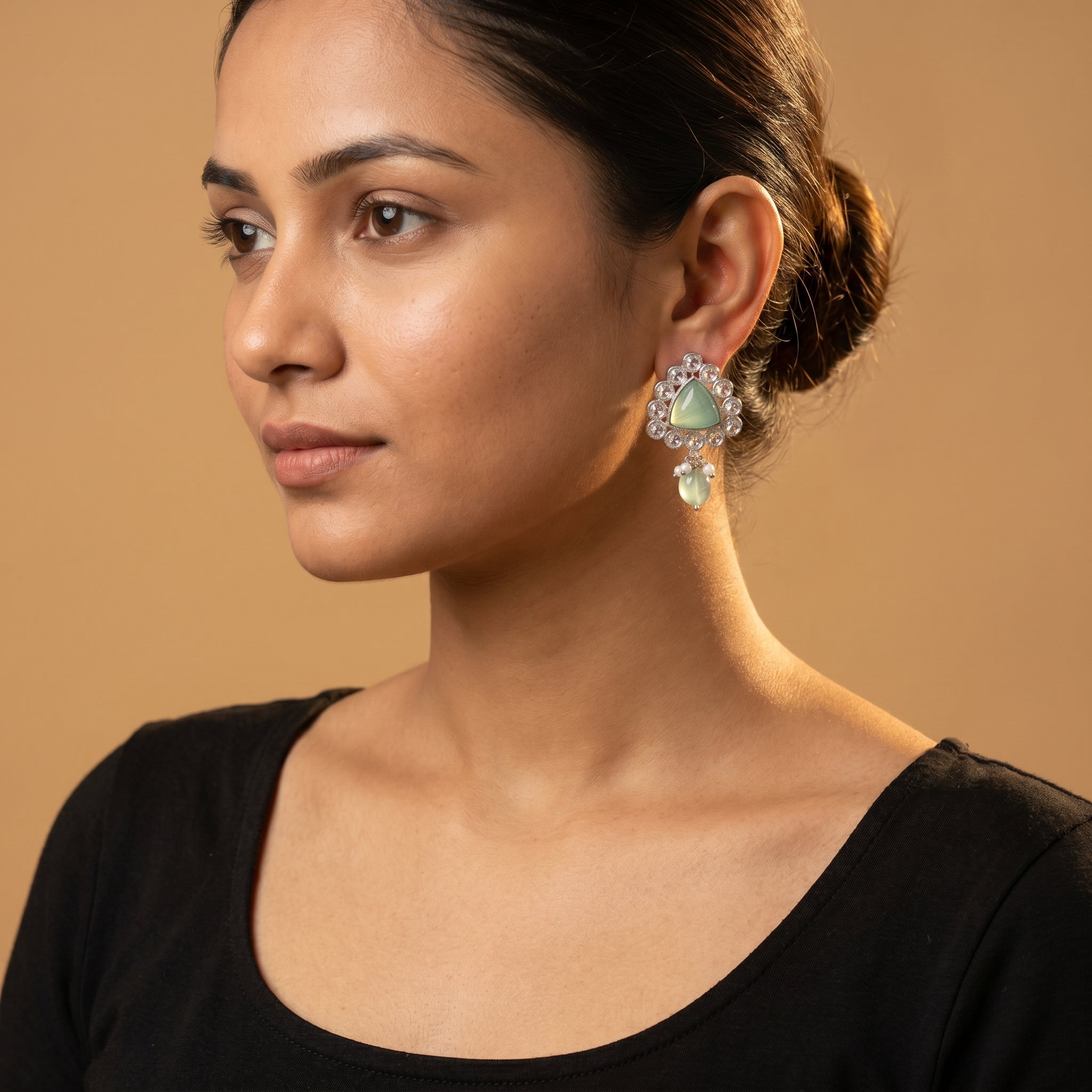 Rani Aqua Earrings detail showing crystal halo triangular cabochon and green bead pearl drop