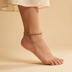 Midnight Glimmer Anklet detail of alternating navy and clear bezels