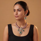 Meena Emerald Necklace Set detail of meenakari lattice and emerald teardrop drops