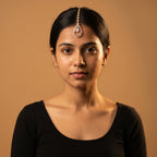 Aira Moonstone Tikka detail showing thirteen-stone chain and milky moonstone center with pavé halo