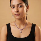 Rani Ruby Necklace Set detail of ruby pear drop pendant and crystal halo setting