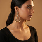Chandni Pearl Earrings detail showing polki crescent, pink stone row, and cream pearl dangles