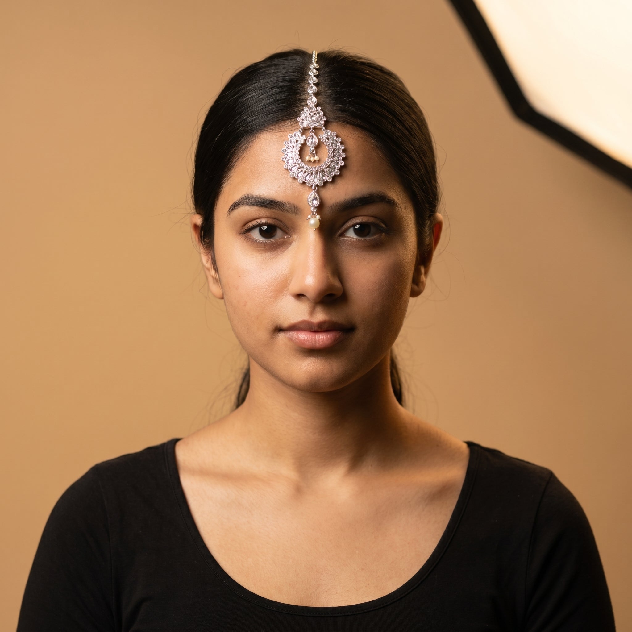 Rani Pearl Tikka detail showing teardrop chain pearl center and bottom pearl cluster