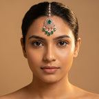 Panna Tikka detail showing green stone pendant and crystal teardrop chain
