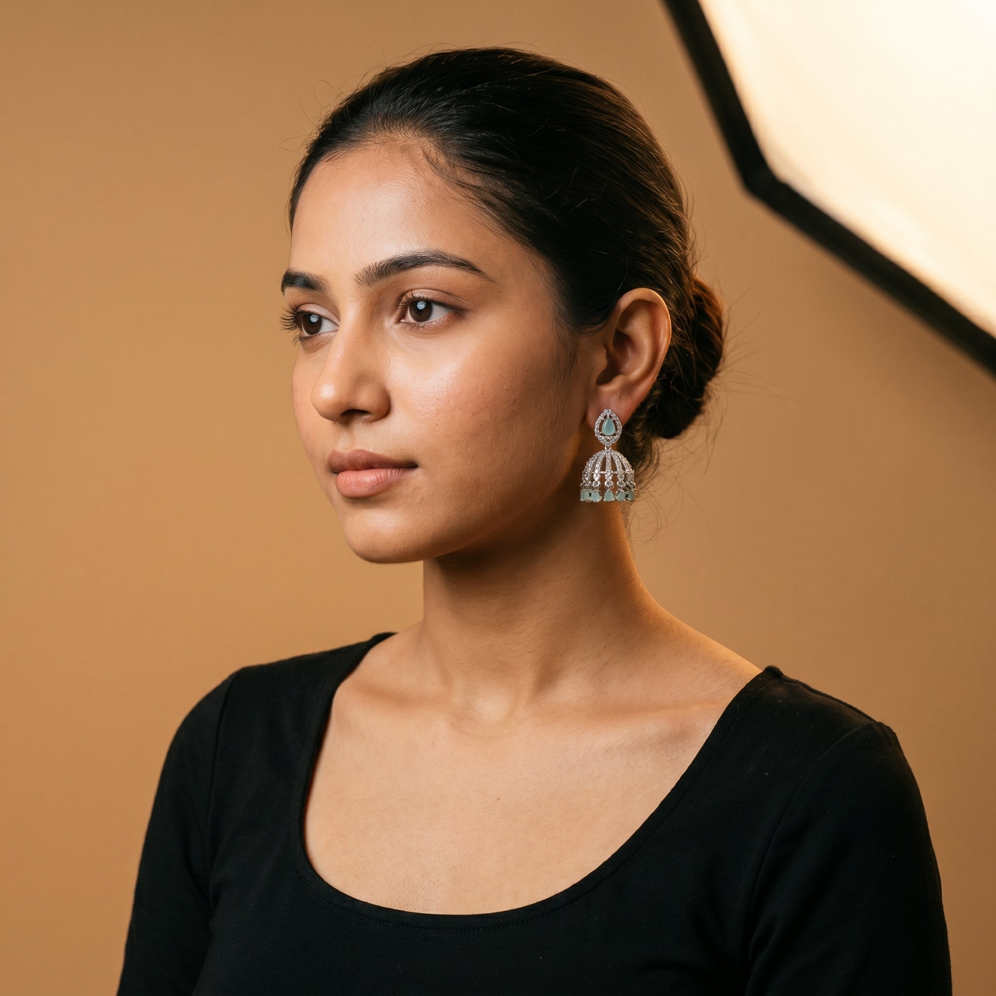 Aira Mint Earrings detail showing cage bell ribs and mint drops