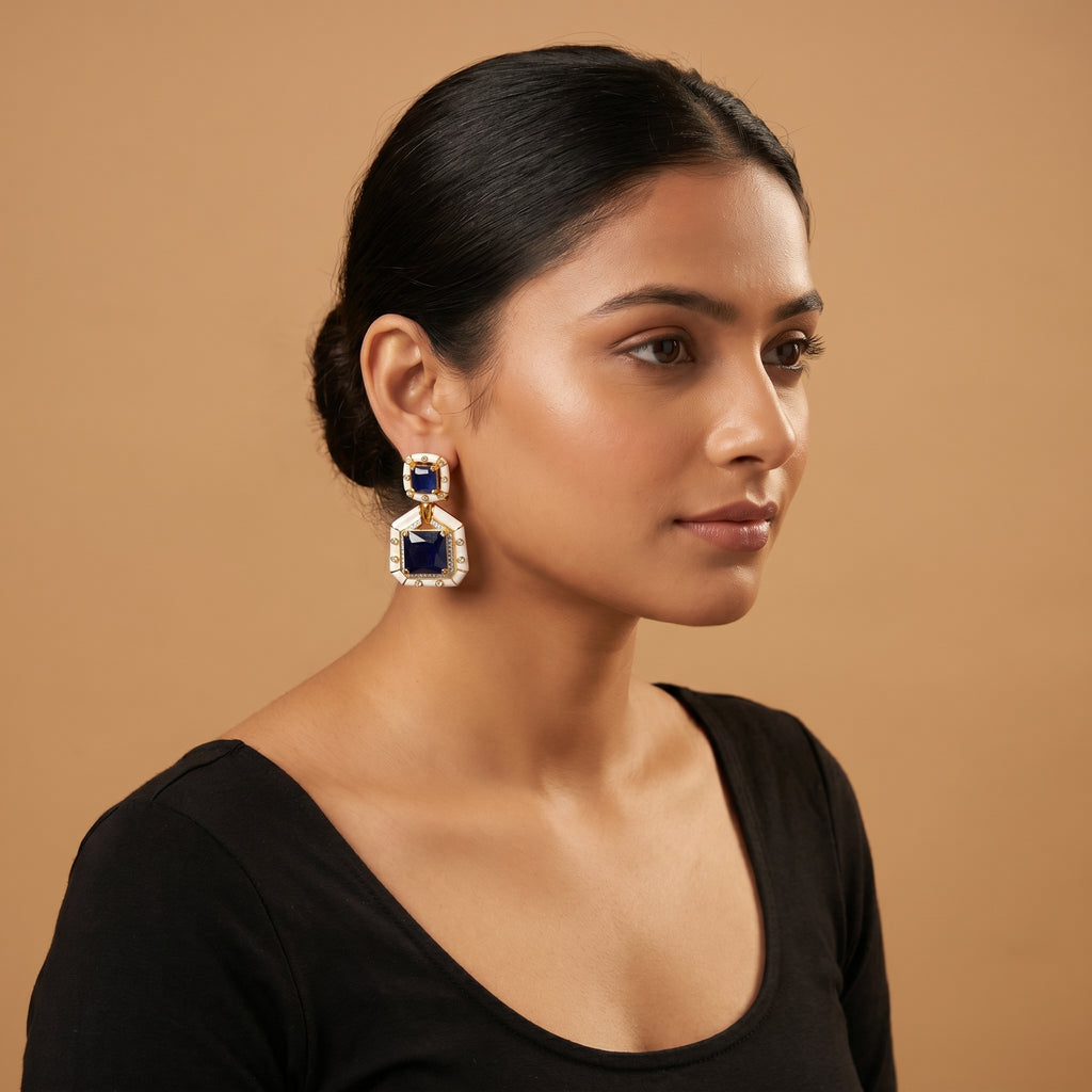 Neelam Enamel Earrings detail showing hinged sections, sapphire-blue centers, and crystal pavé halo