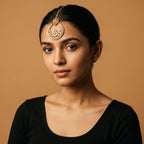 Kamal Crystal Tikka detail showing champagne teardrop chain links and pearl-lined crescent pendant