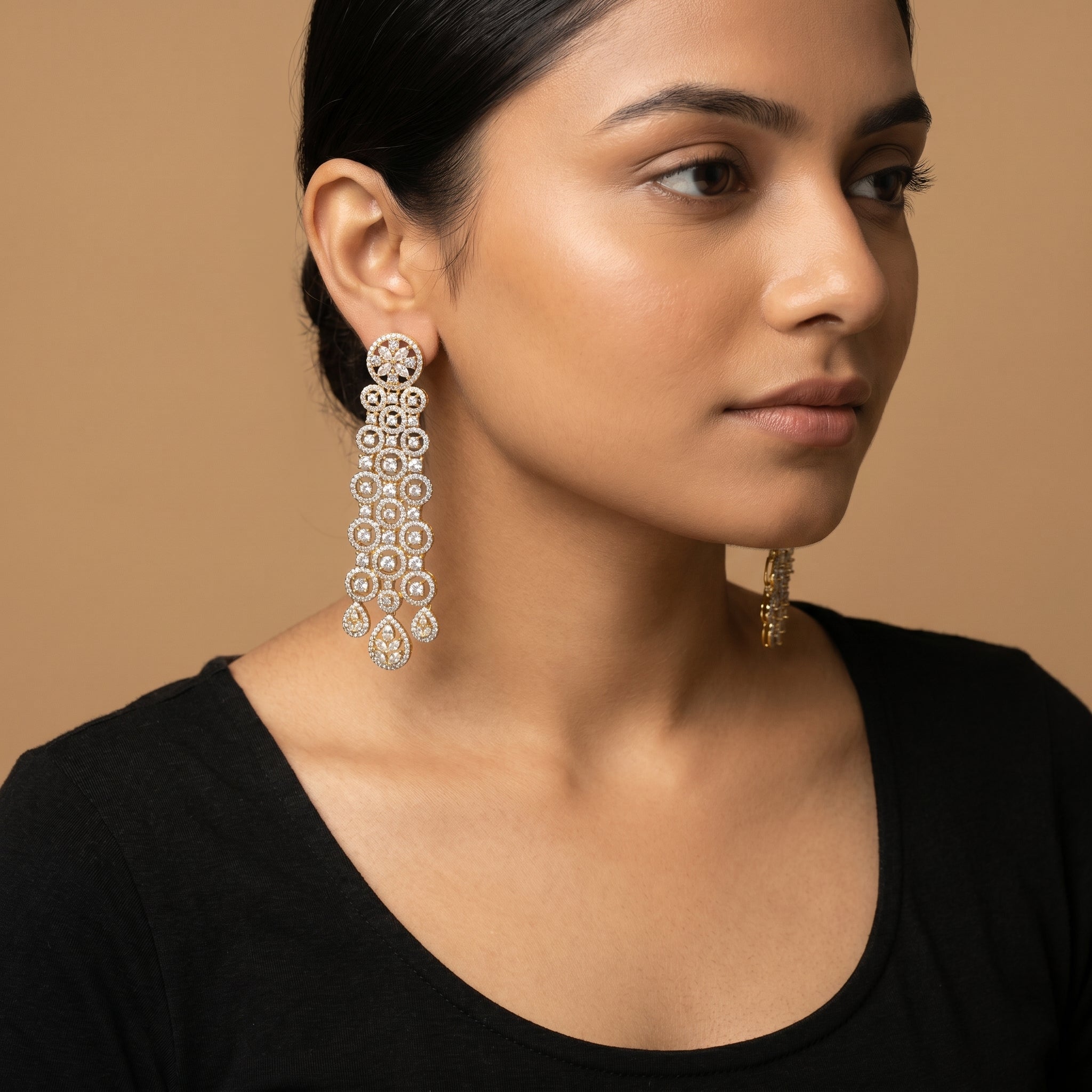 Rani Cascade Earrings detail showing stacked circle tiers and triple teardrop dangles