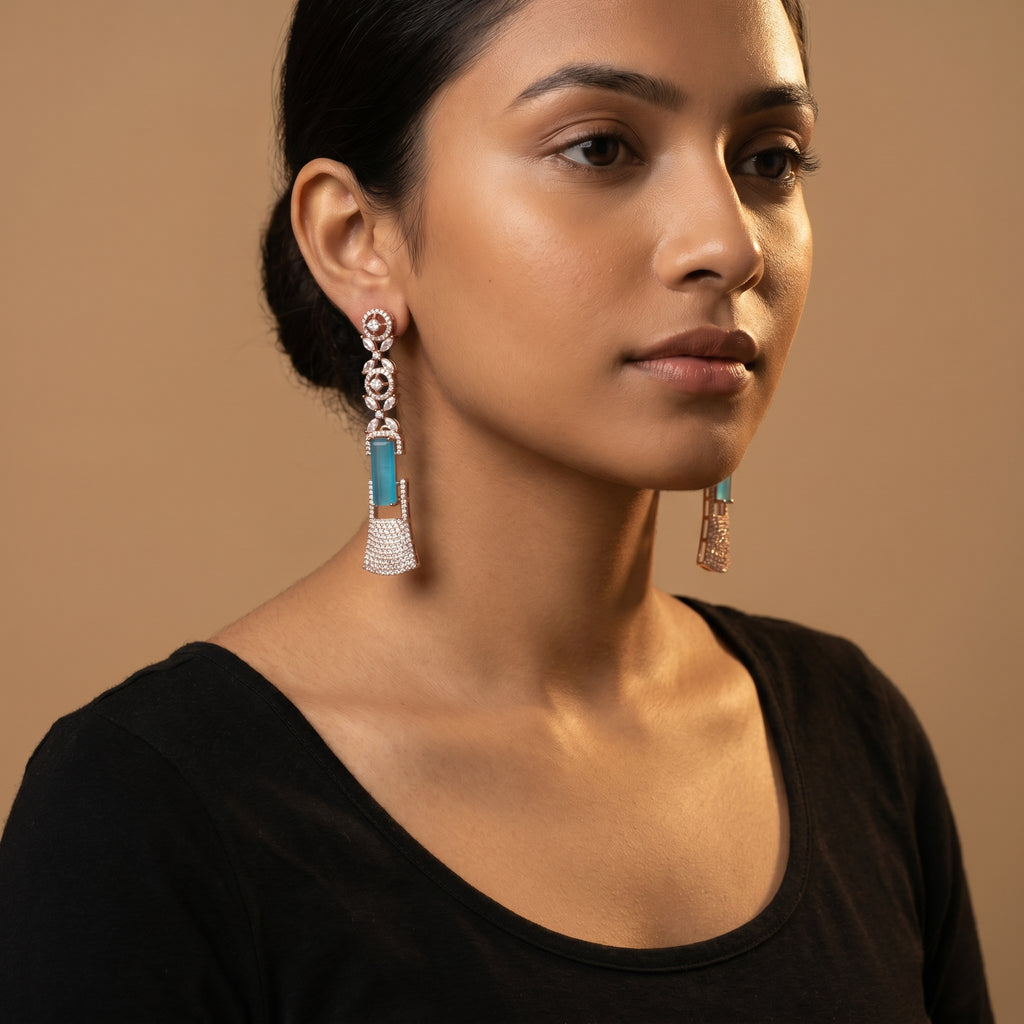Rani Firoza Earrings detail showing marquise links blue center stone and pavé fan base