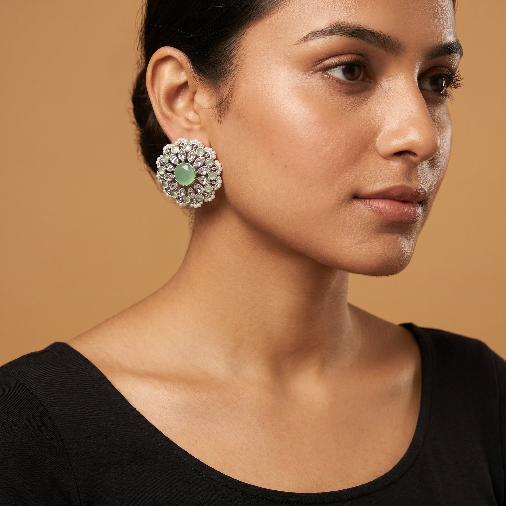 Mint Bloom Earrings detail showing marquise clear crystals, green cabochon ring, and pearl edge