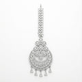 Crystal Crest Tikka silver-tone circular maang tikka with clear stones and five pear drops on gray background