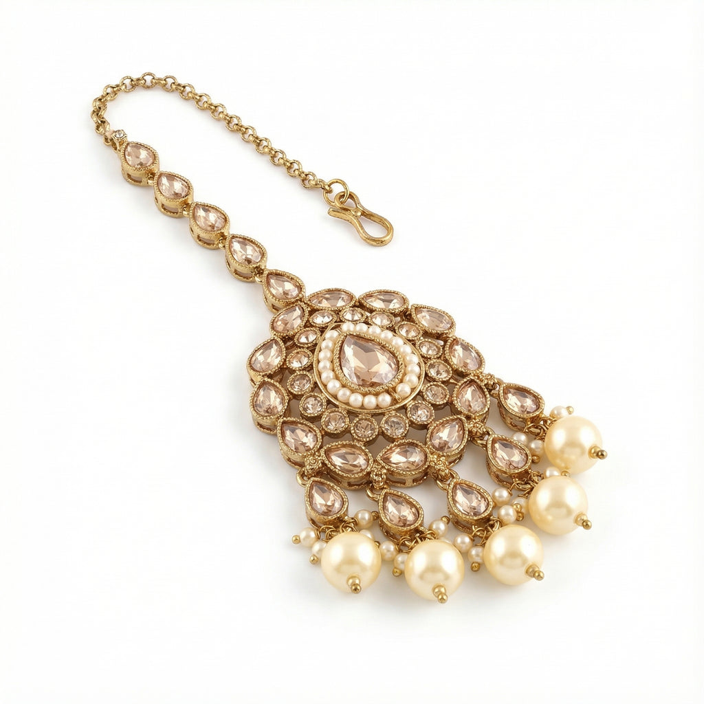 Ivory Glow Teardrop Tikka detail showing pearl-ringed center and scalloped kundan petals