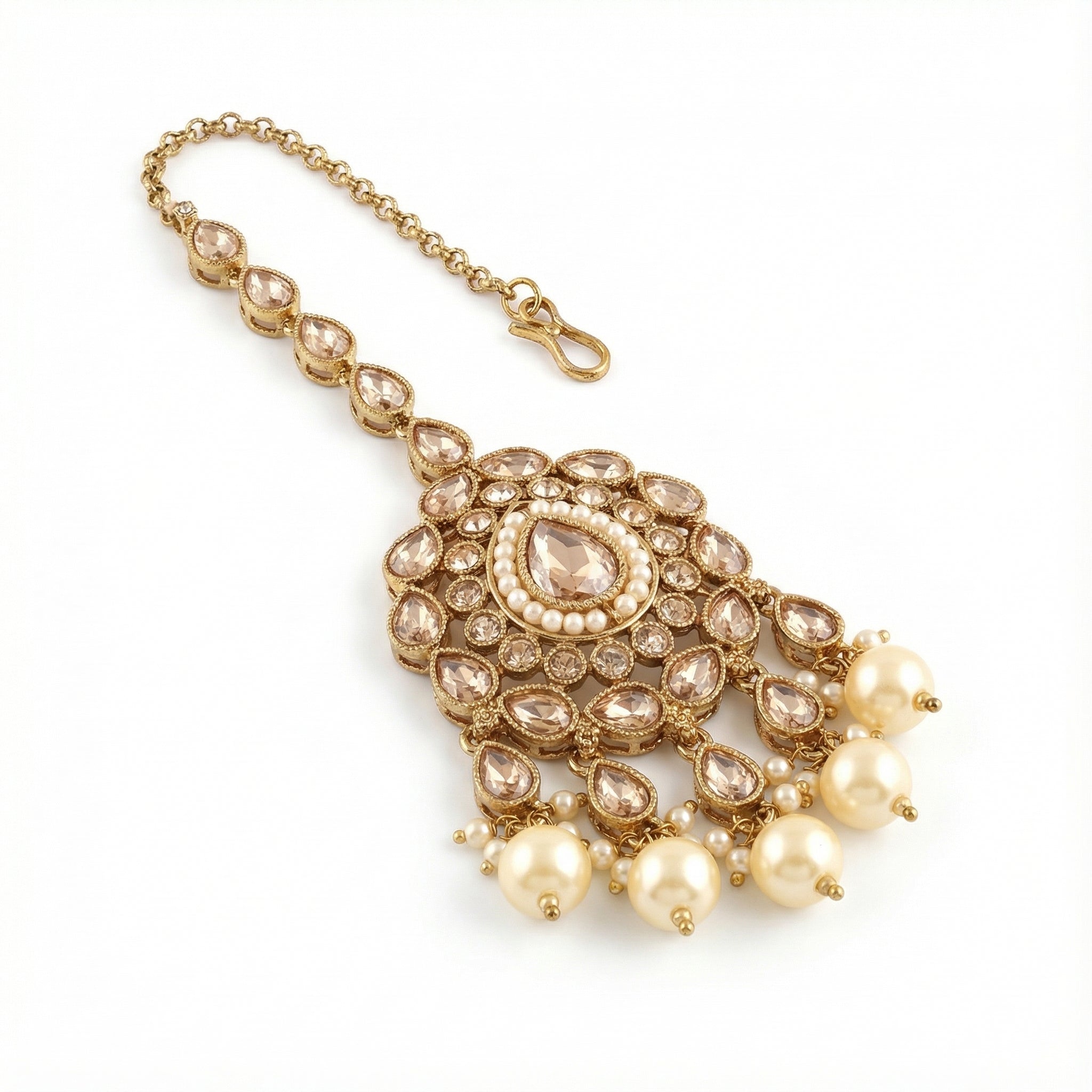 Ivory Glow Teardrop Tikka detail showing pearl-ringed center and scalloped kundan petals