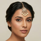 Ivory Glow Teardrop Tikka detail showing pearl-ringed center and scalloped kundan petals