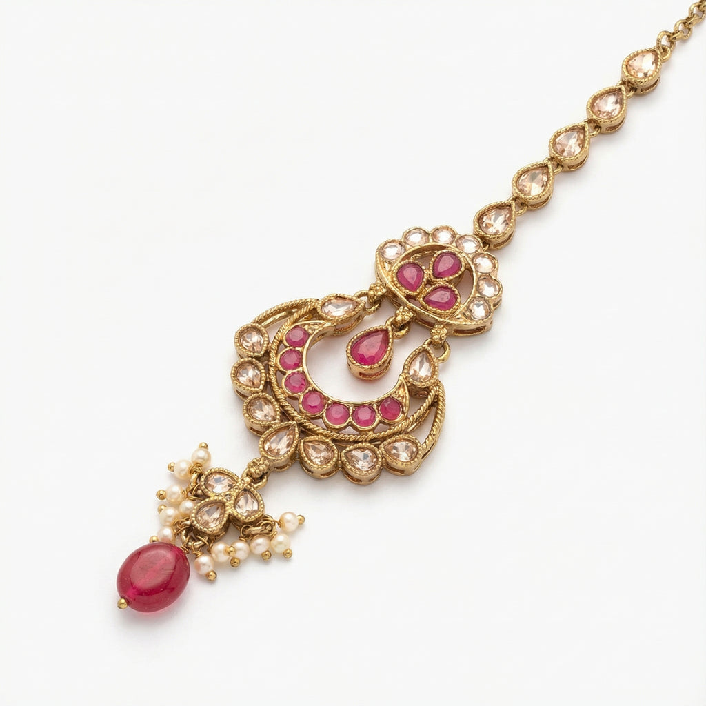 Zarrah Ruby Crescent Tikka detail showing ruby crescent motif and oval pink bottom bead